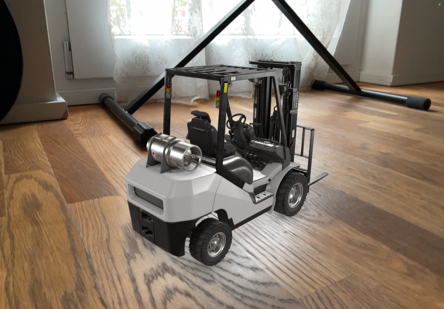 Forklift model placed in a room via AR Quick Look on iPhone